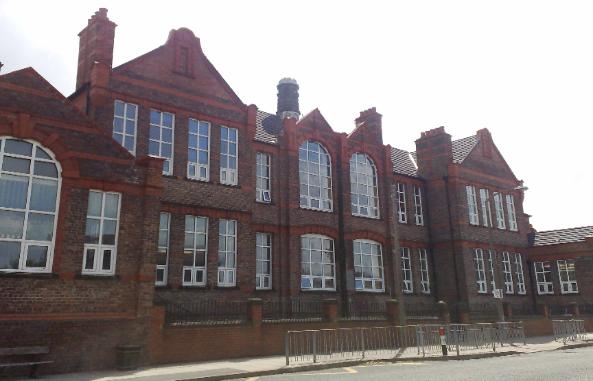 The Sixth School Sited in Back Lane